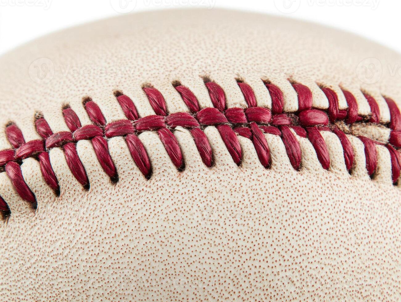 Close-up view of a baseball highlighting its stitching details photo