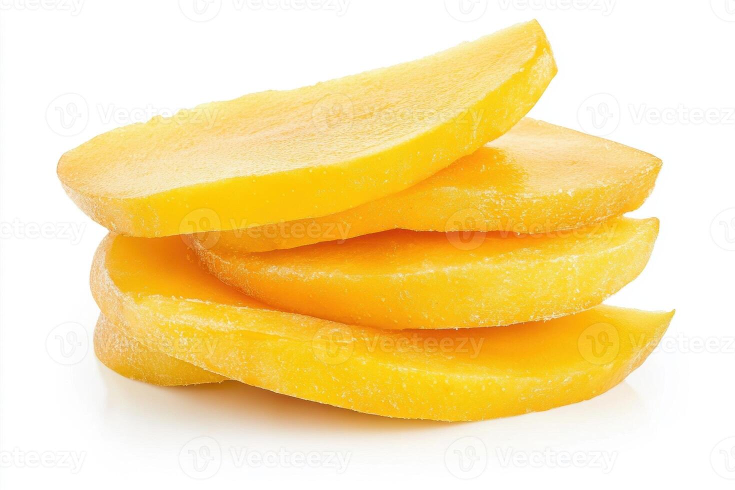 Fresh mango slices stacked on a white surface for a healthy treat photo