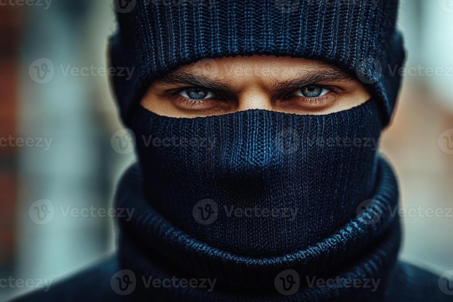 Mysterious figure wearing a dark knit mask in an urban setting photo