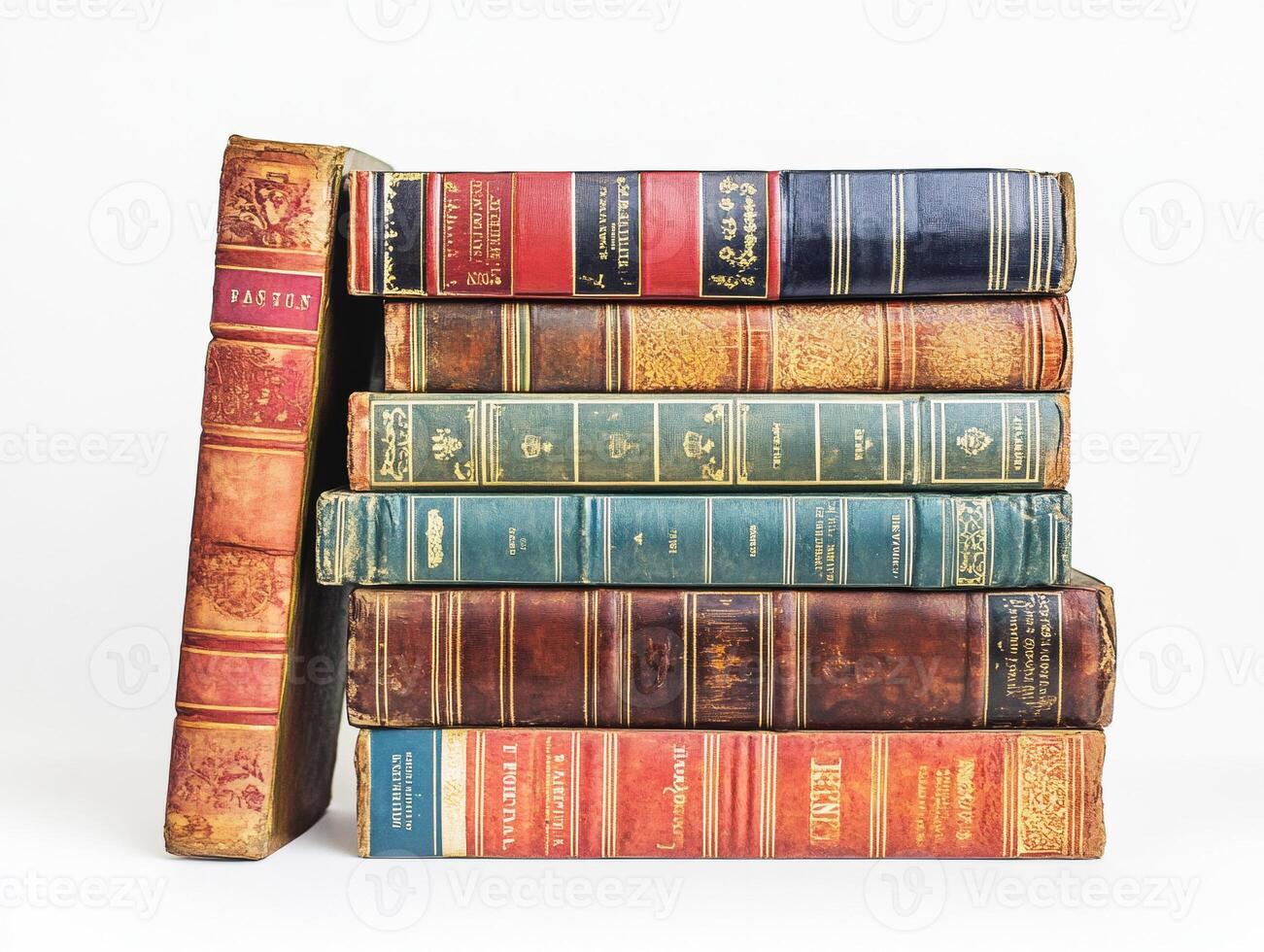 Vintage leather-bound books stacked on a white background photo