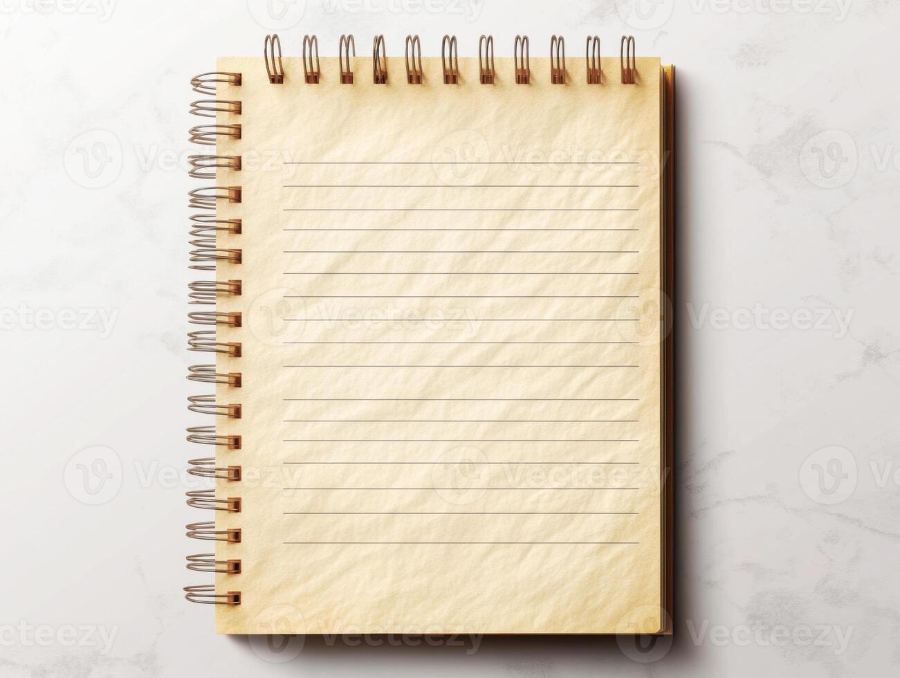 Empty notepad on a marble surface for writing notes or ideas photo