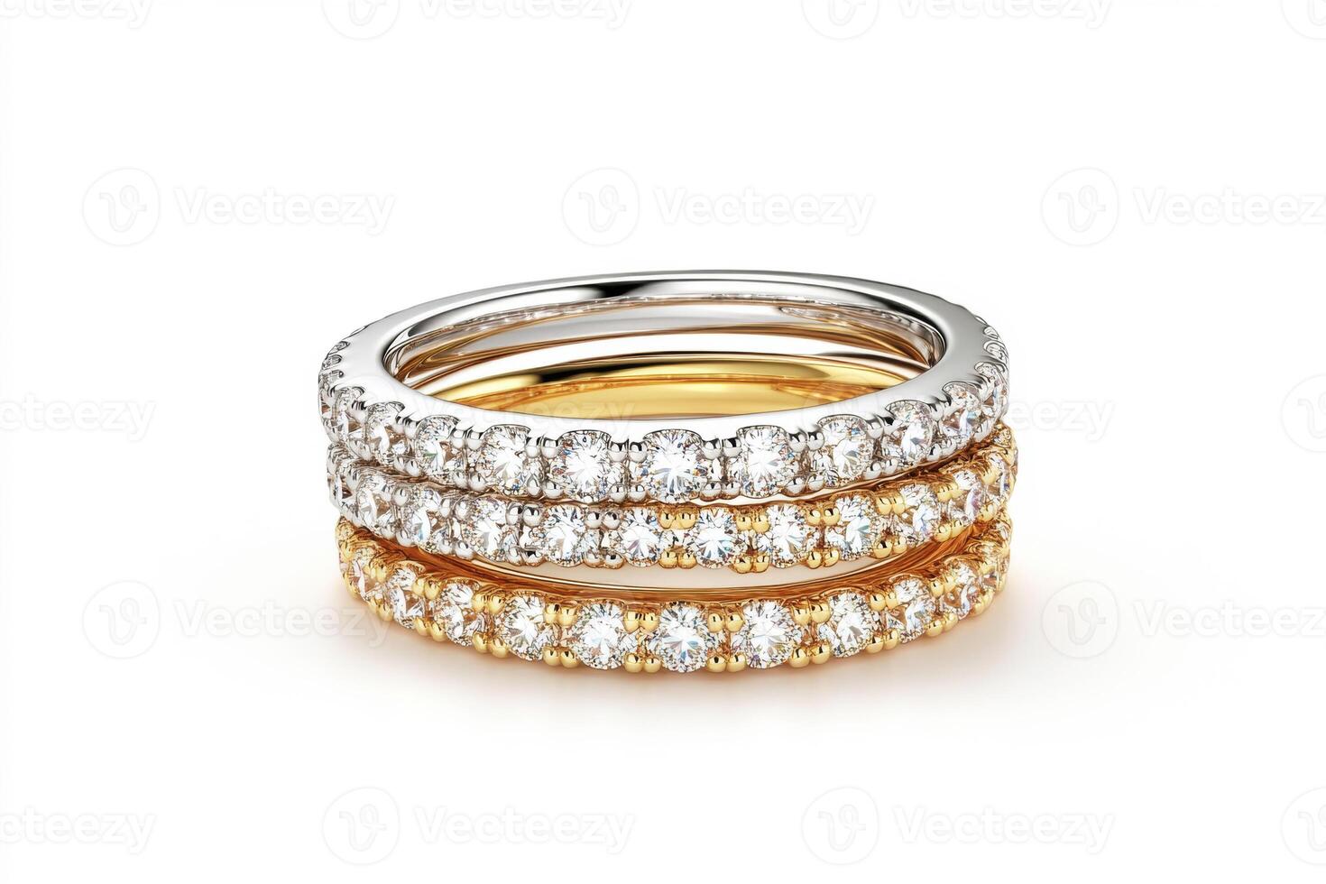Elegant stacked rings with sparkling gemstones in gold and silver photo