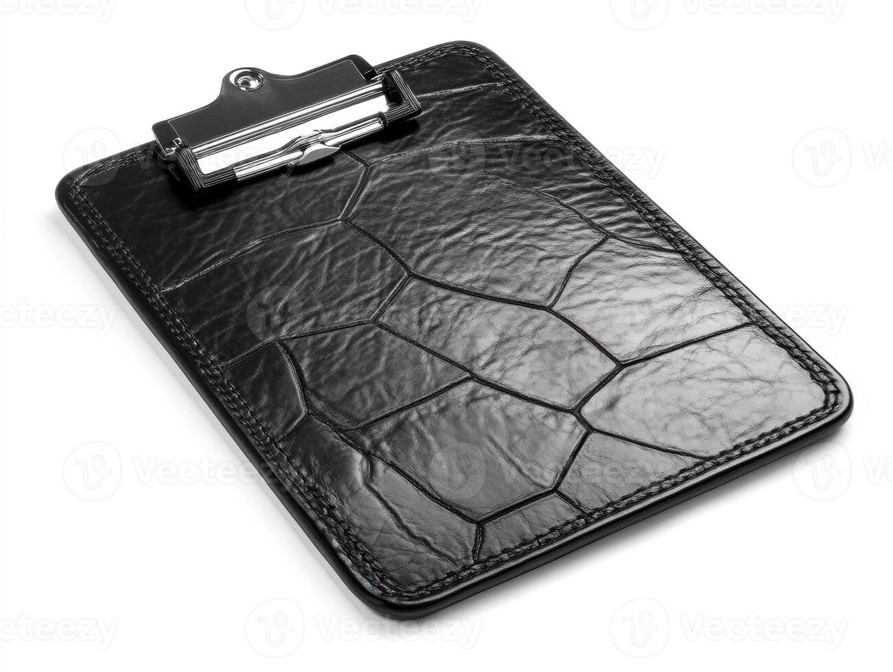 Black leather clipboard placed on a flat surface for note taking photo