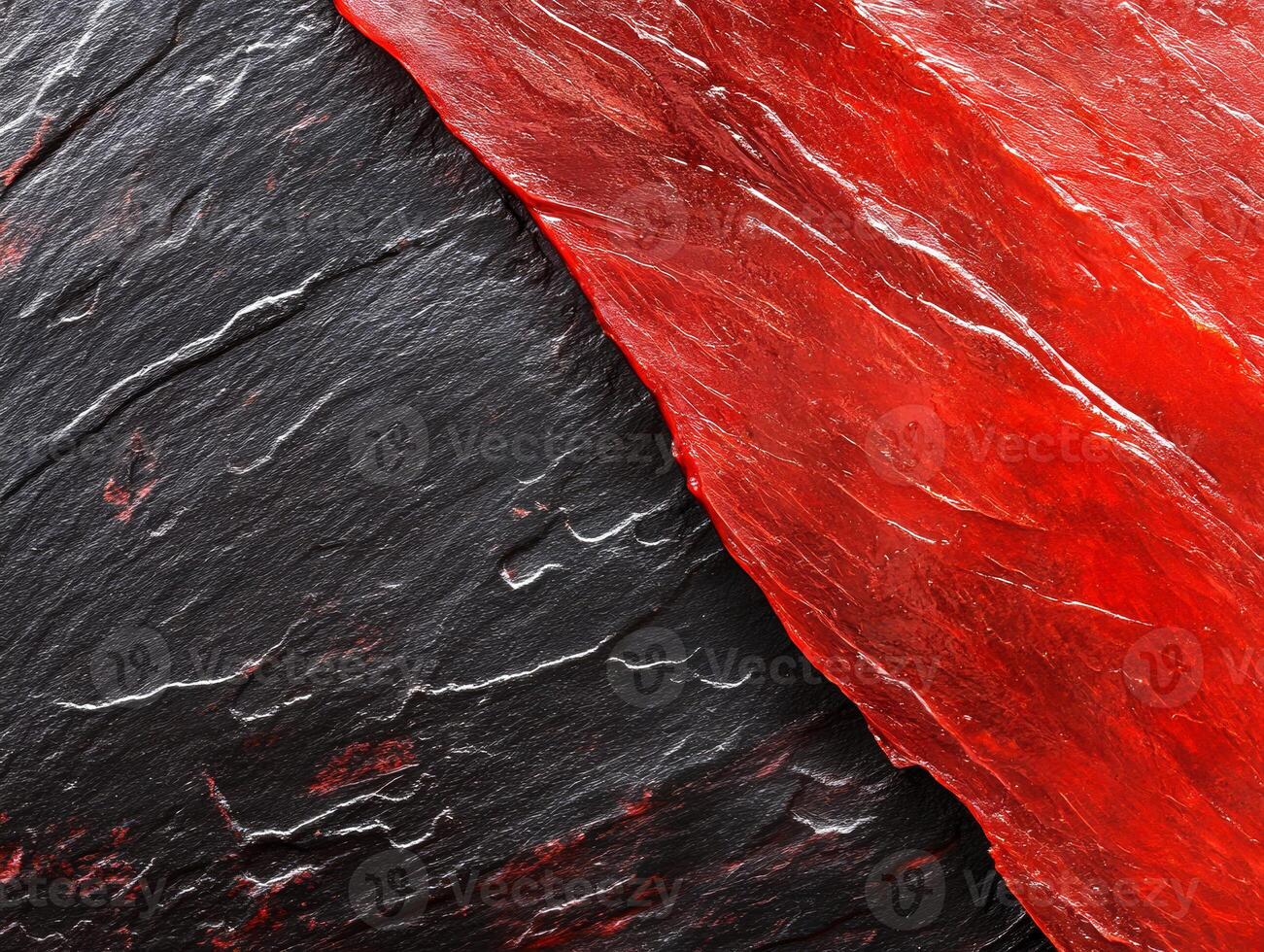 Textured surfaces showcasing contrast between black and red patterns photo