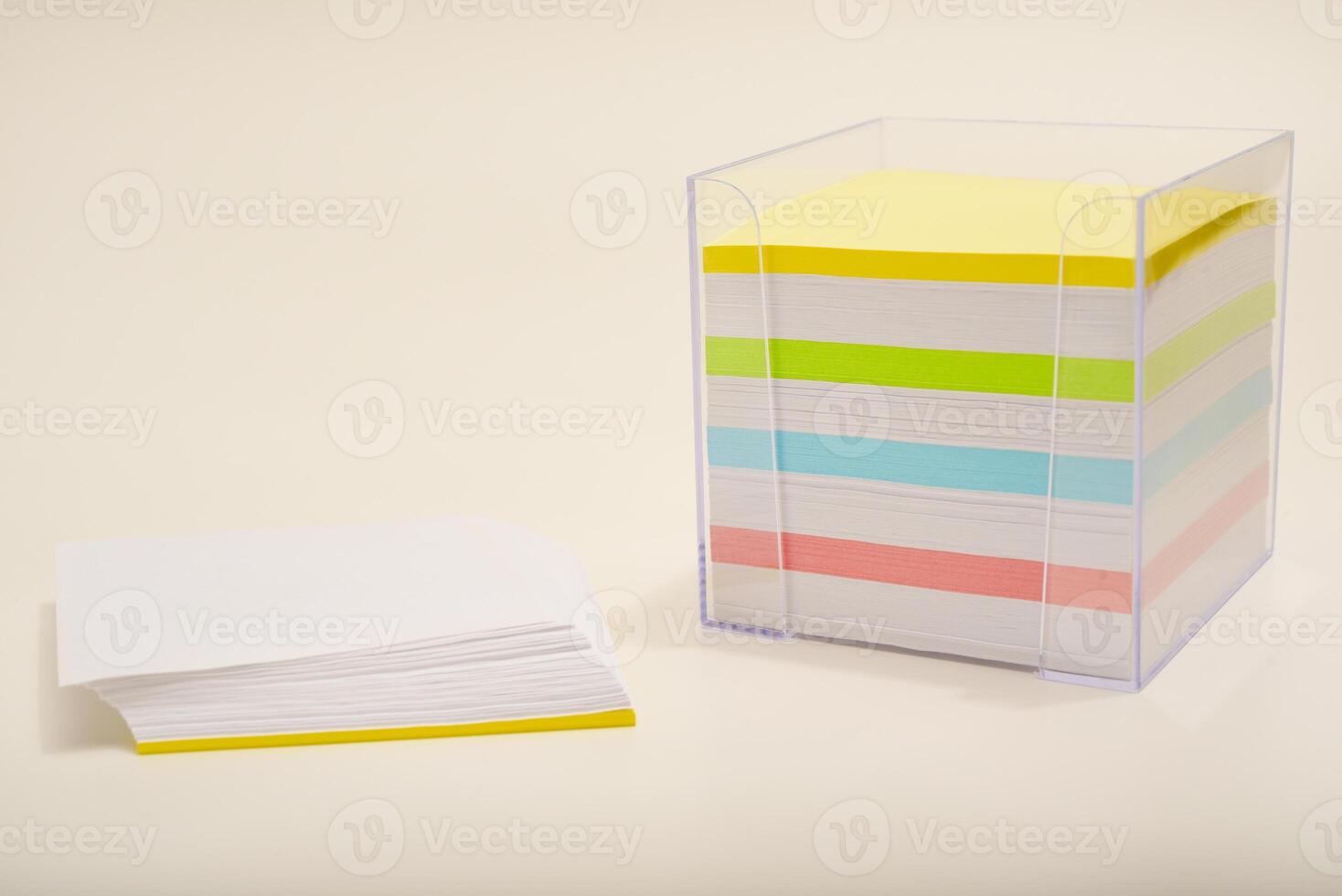 A paper block in the office. Writing pad with sheets for annotations. photo