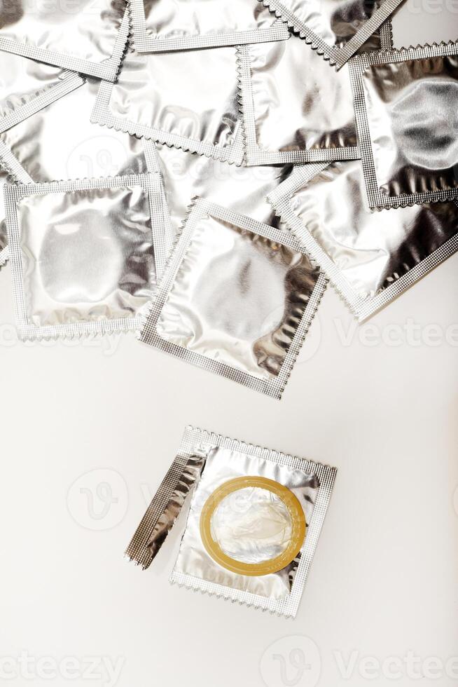 An open condom in a package. Male contraceptives. Secure Seal Technology for Ultimate Safety photo