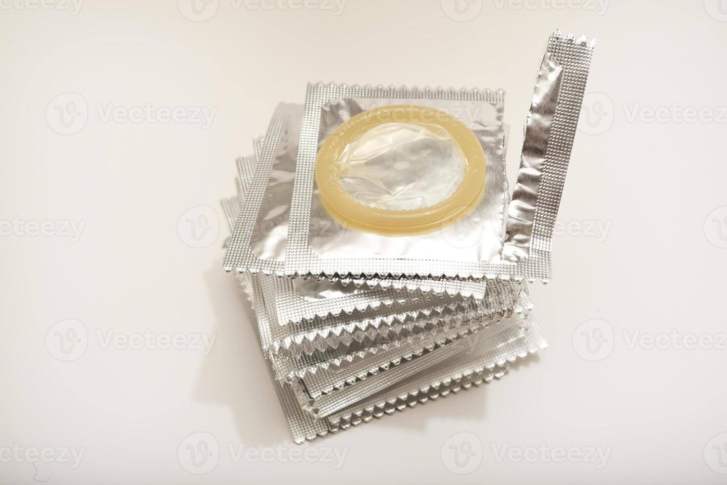 An open condom in a package. Male contraceptives. Trusted Contraceptive Solution photo