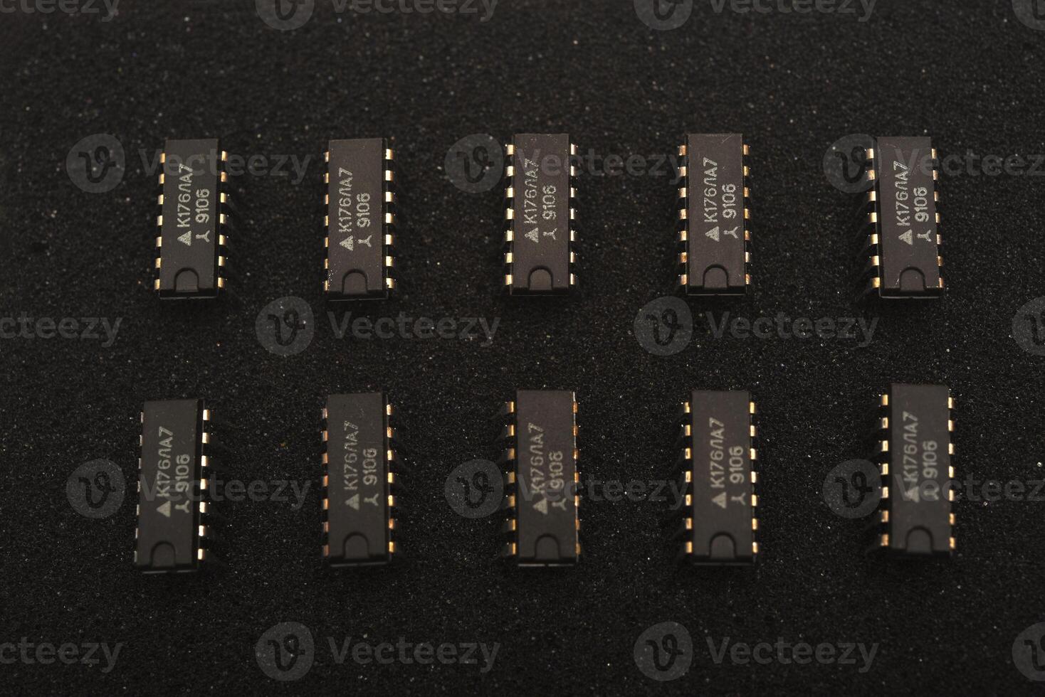 Chip modules on shadow foam. Layered elements on a plate. photo