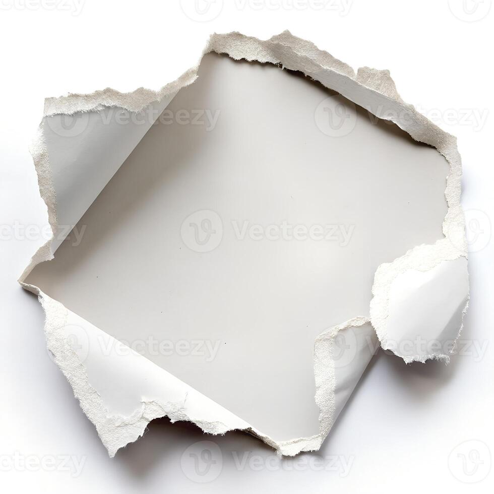 A torn piece of paper revealing a blank space perfect for your message or design with soft white background and irregular edges showing texture photo