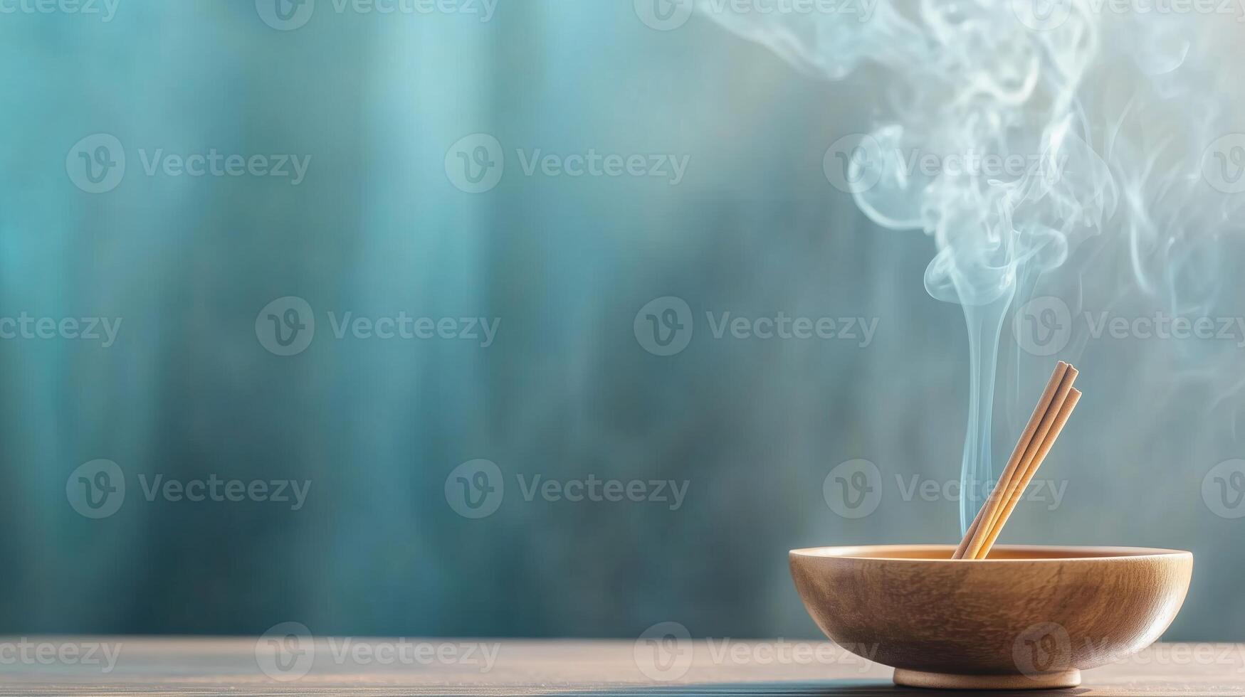 Incense burning in wooden bowl creates serene atmosphere with smoke rising against a tranquil background photo