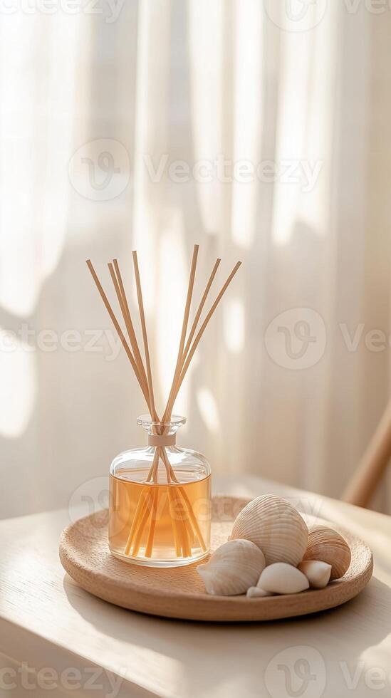 Elegant aroma diffuser with wooden sticks and seashells on a decorative plate in a softly lit room photo