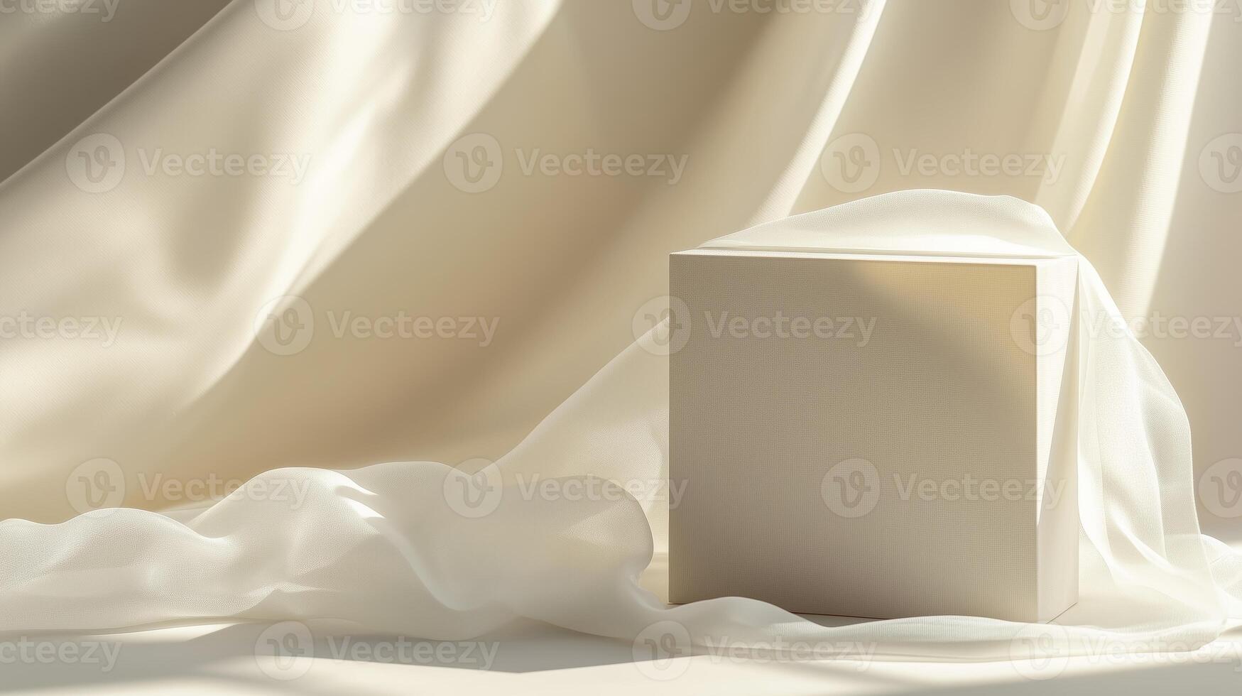 Minimalist square object on soft fabric backdrop showcasing elegance and simplicity in a serene setting photo