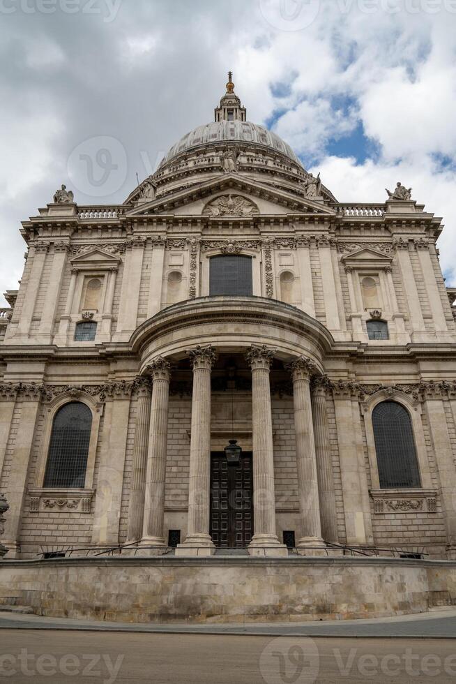 The Cathedral of St. Paul is captured head on, dis playing its monumental dome and sculpted stonework, a true masterpiece of English Baroque architecture. photo
