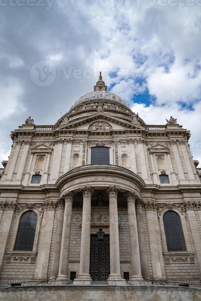 The Cathedral of St. Paul is captured head on , displaying its monumental dome and sculpted stonework, a true masterpiece of English Baroque architecture. photo