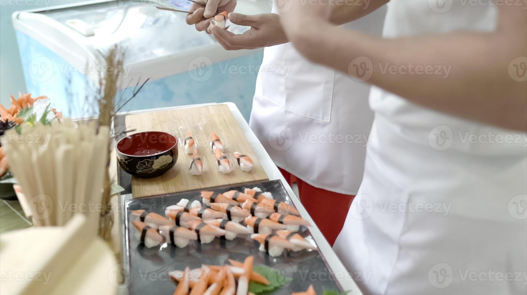 Crab sushi, traditional Japanese food style. Sliced crab stick on rice display for photo shooting.