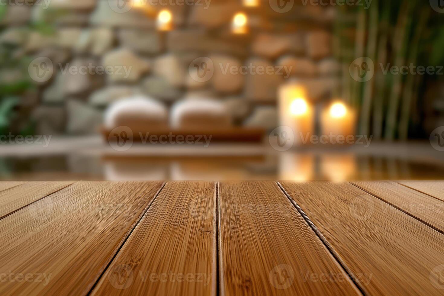 Polished teak wood surface with blurred luxury spa room in distance, featuring stone walls, bamboo, and candlelight ambiance photo