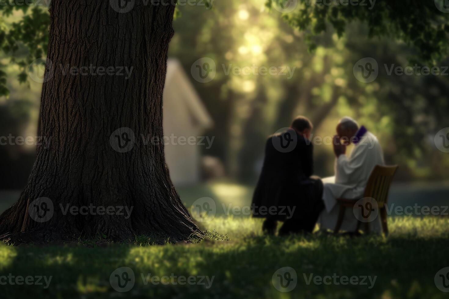 a Priest listening to man talking about problems in outdoor tree trunk. photo