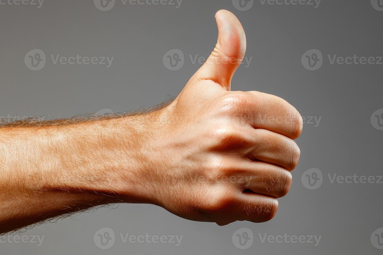 a hand with thumb up, making the ok symbol. with white background isolate. photo