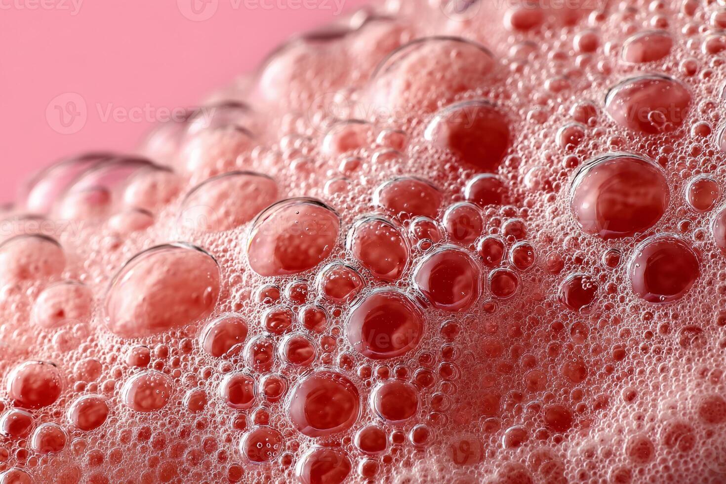 Pink foam texture with bubbles photo