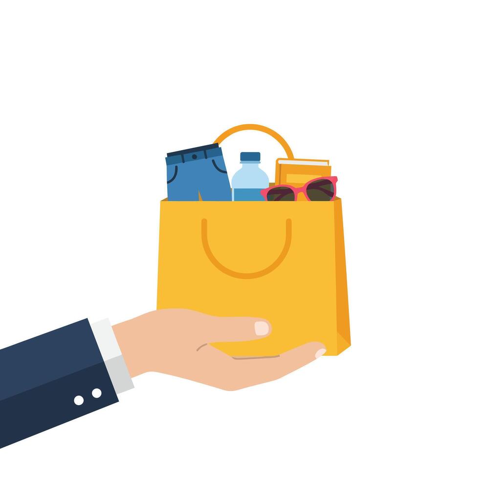 Hand holding a shopping bag filled with items in flat art style vector