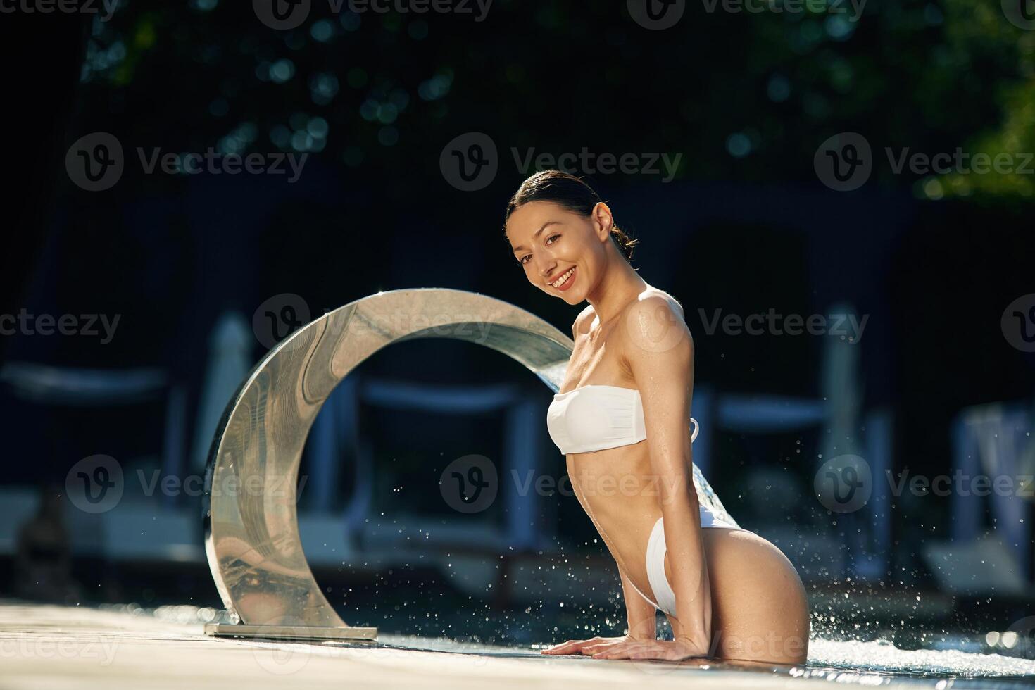 Conception of, resort and relax. Woman in white underwear is in the pool photo