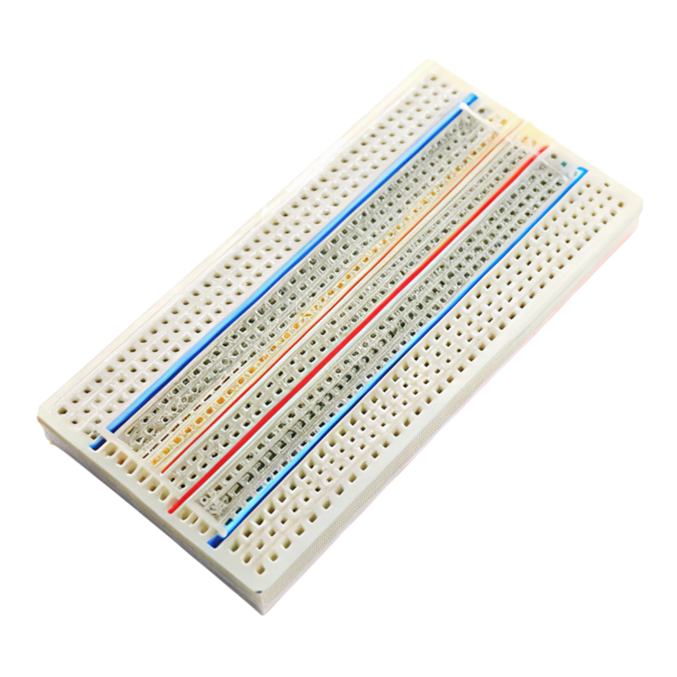 Close up of a breadboard used for circuit prototyping featuring rows of holes and power lines in a compact design png