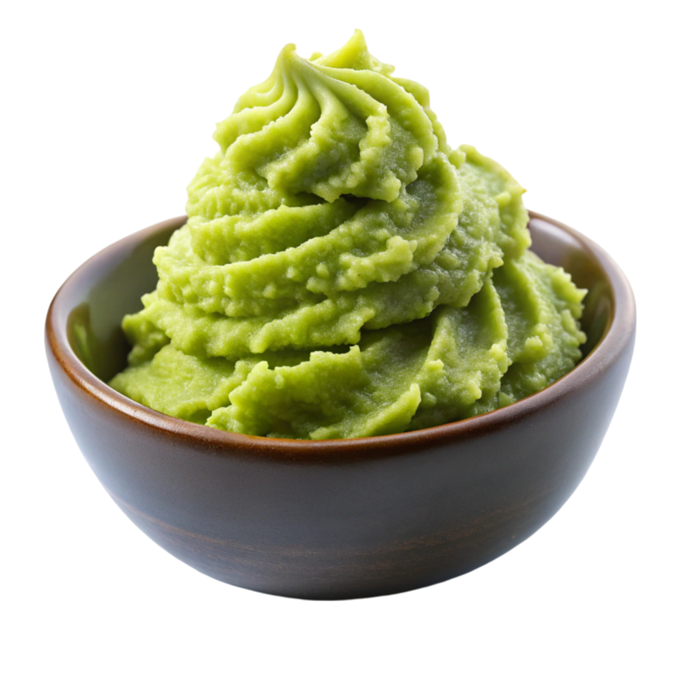 Freshly prepared wasabi puree in a brown ceramic bowl, displayed on white surface, emphasizing spicy flavor png