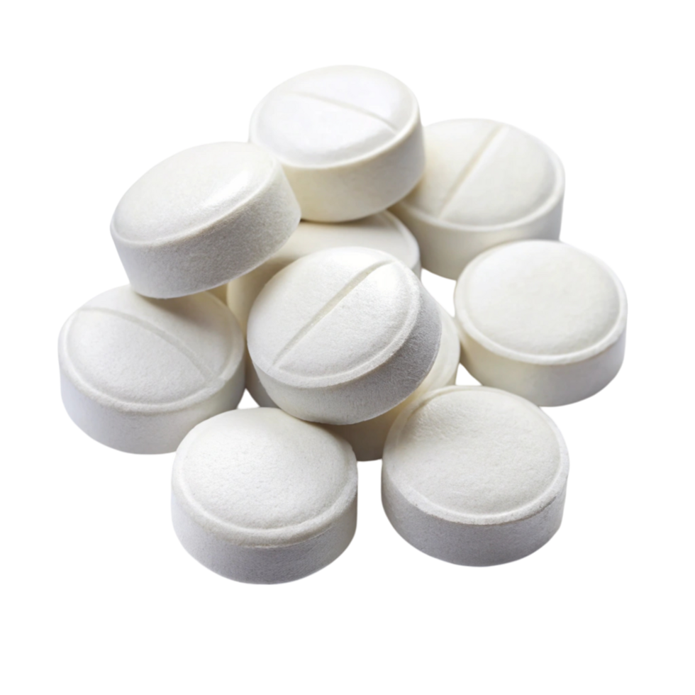 Group of white round antacid tablets on white, perfect for pharmaceutical and health related imagery png