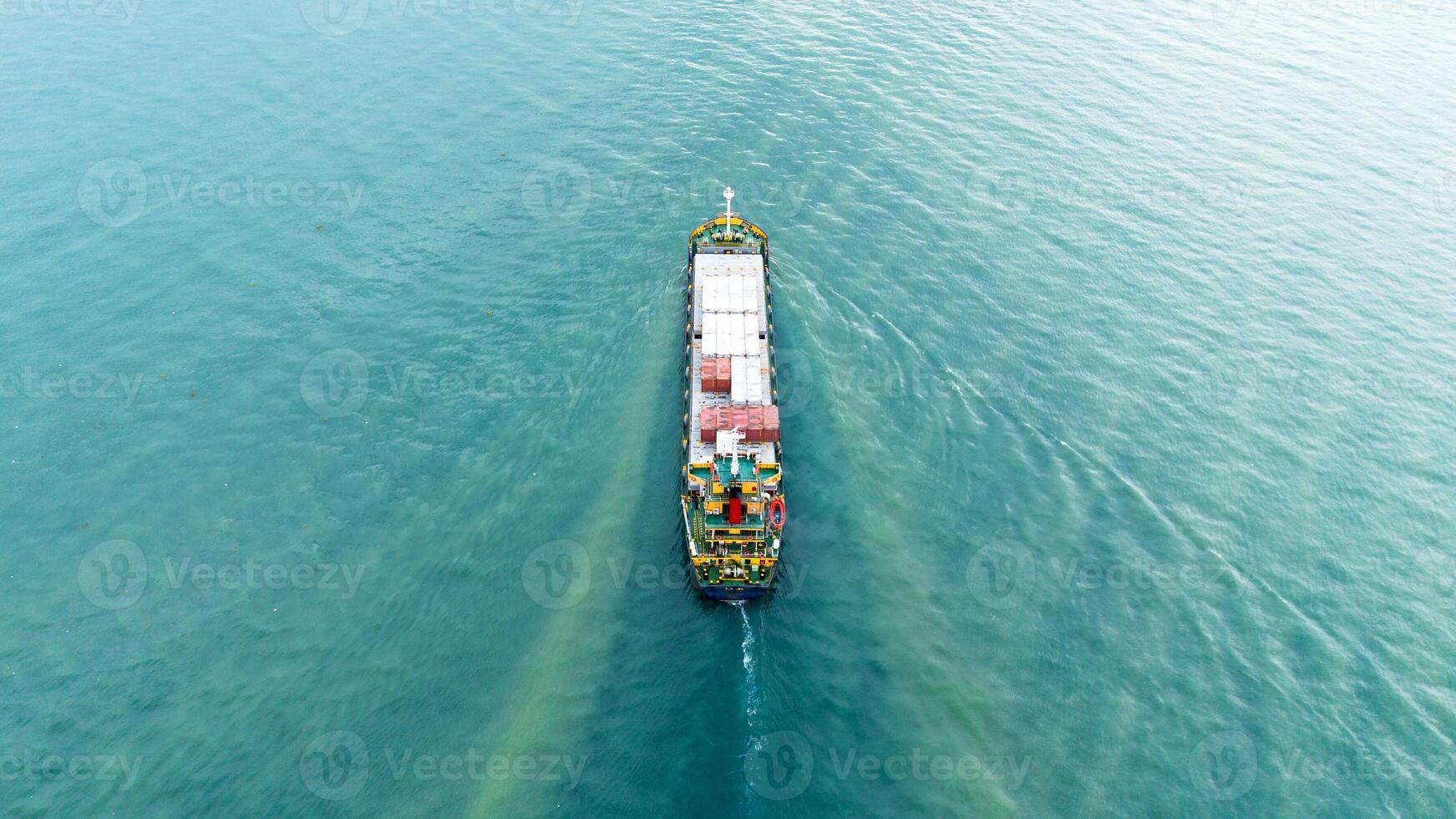 Aerial View of Cargo Ship on Calm Ocean photo