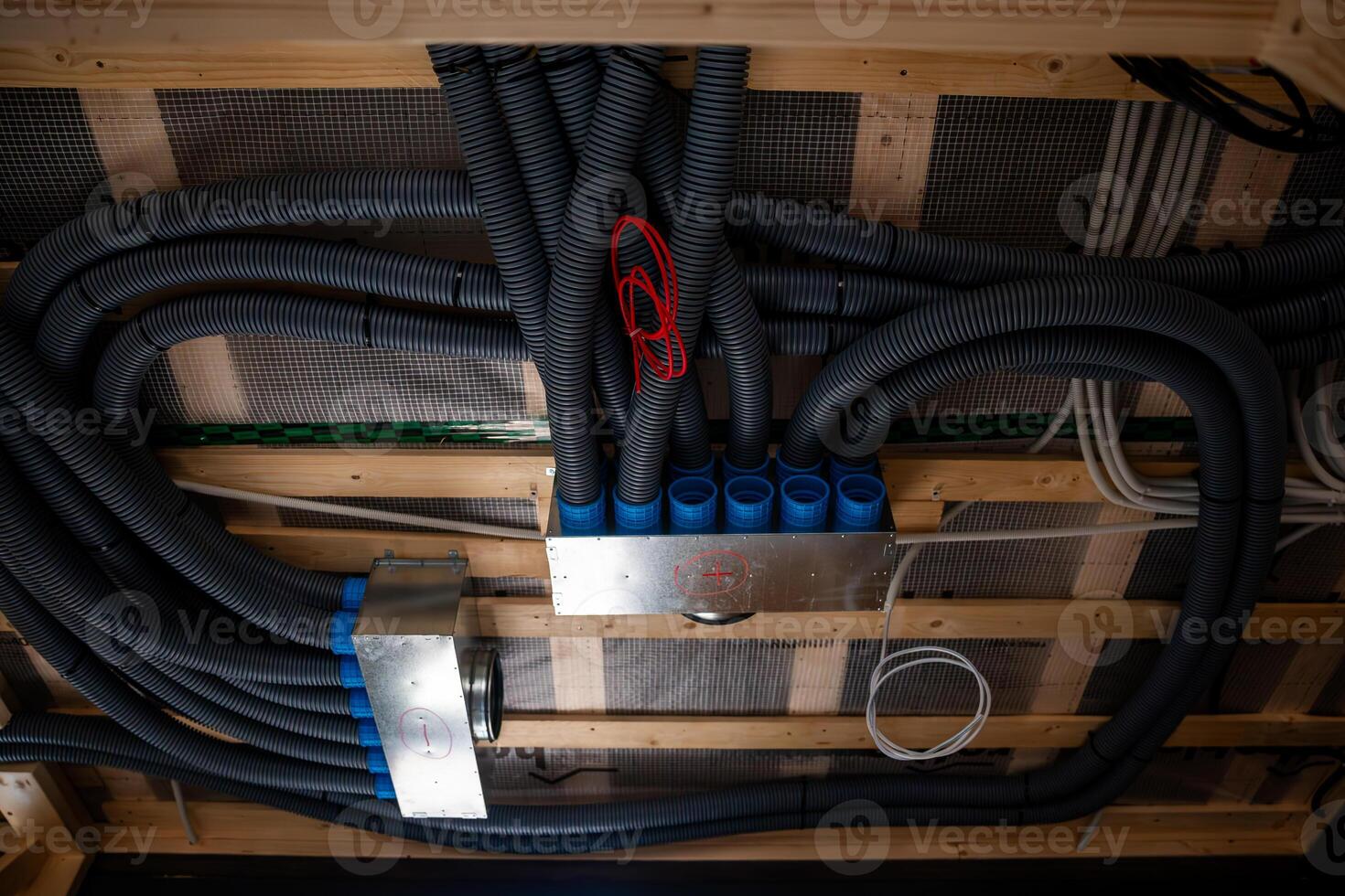 Ventilation System Installation in Wooden House Framework photo