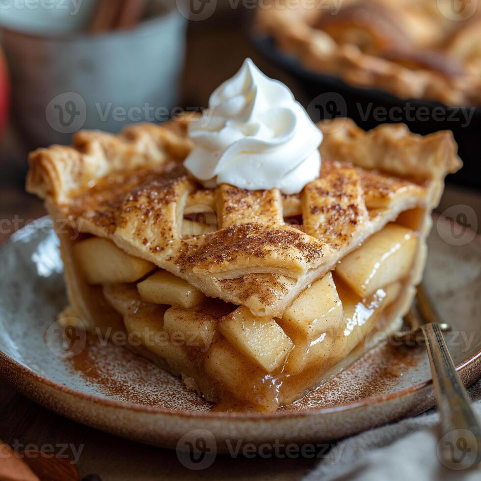 Warm apple pie slice topped with creamy whipped cream served on a rustic plate. photo