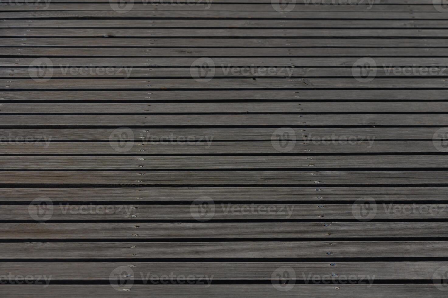 Decking and its elegant efficiency in a serene outdoor space during a bright afternoon photo
