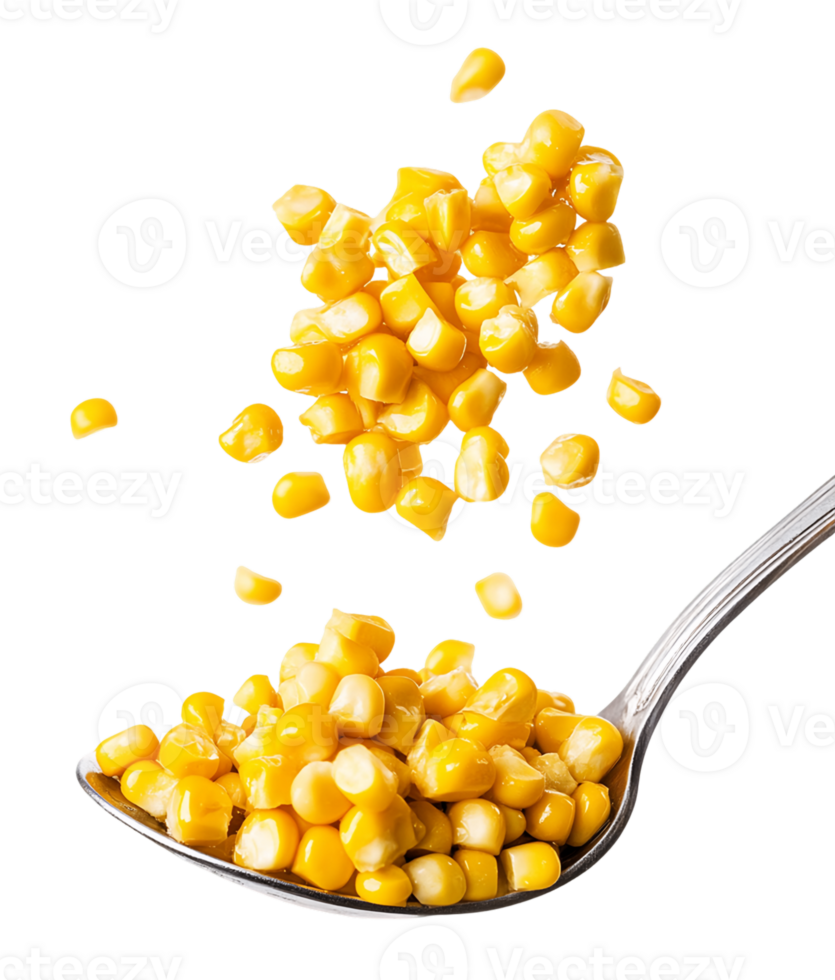 Golden Corn Kernels Falling onto Silver Spoon png