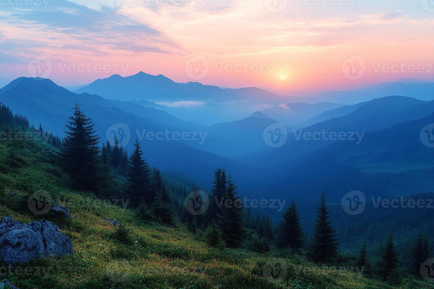 Breathtaking sunrise over misty mountains and lush green valleys in tranquil nature. photo