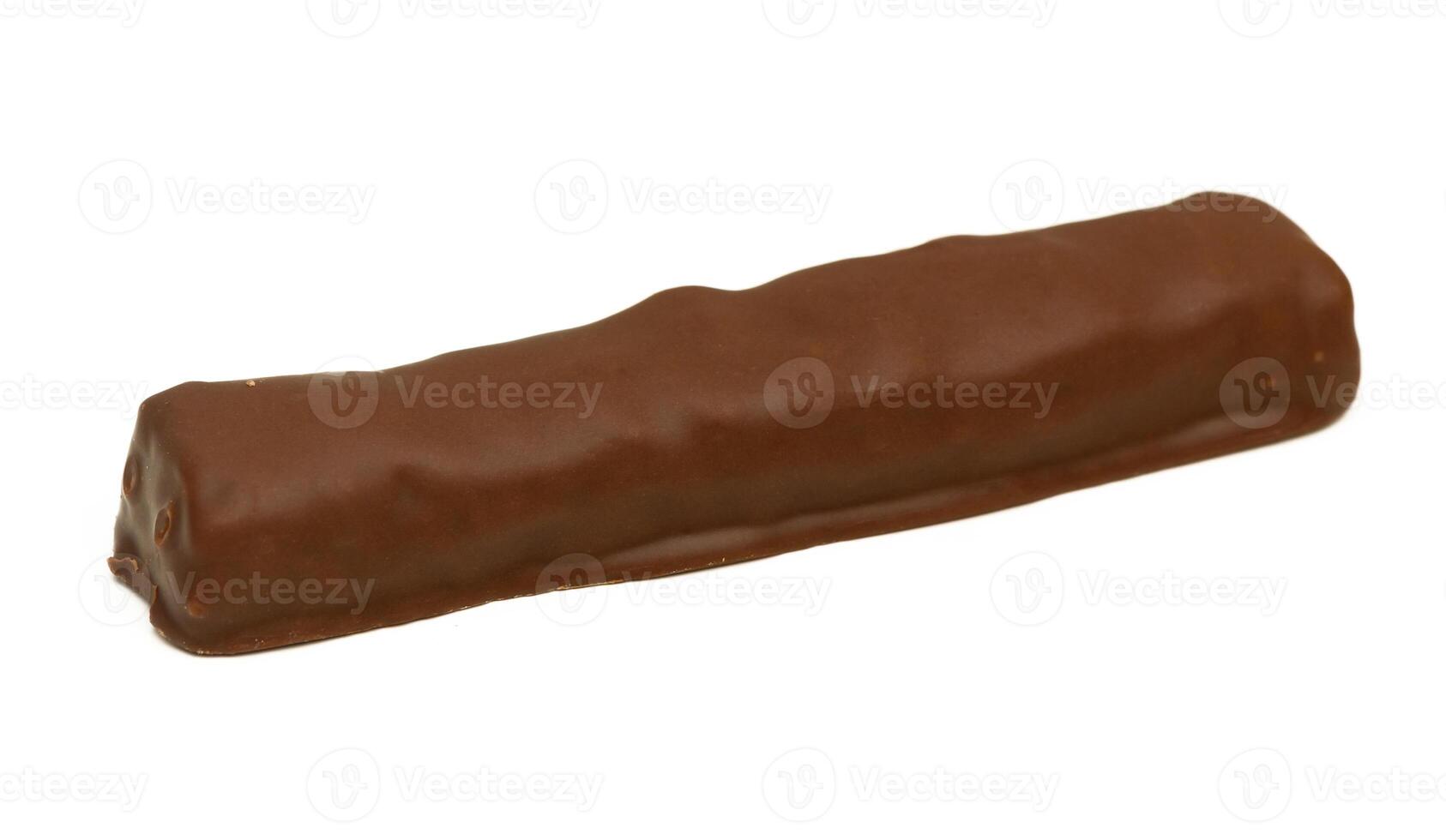 Delightful chocolate bar resting on a clean surface with smooth texture highligh photo