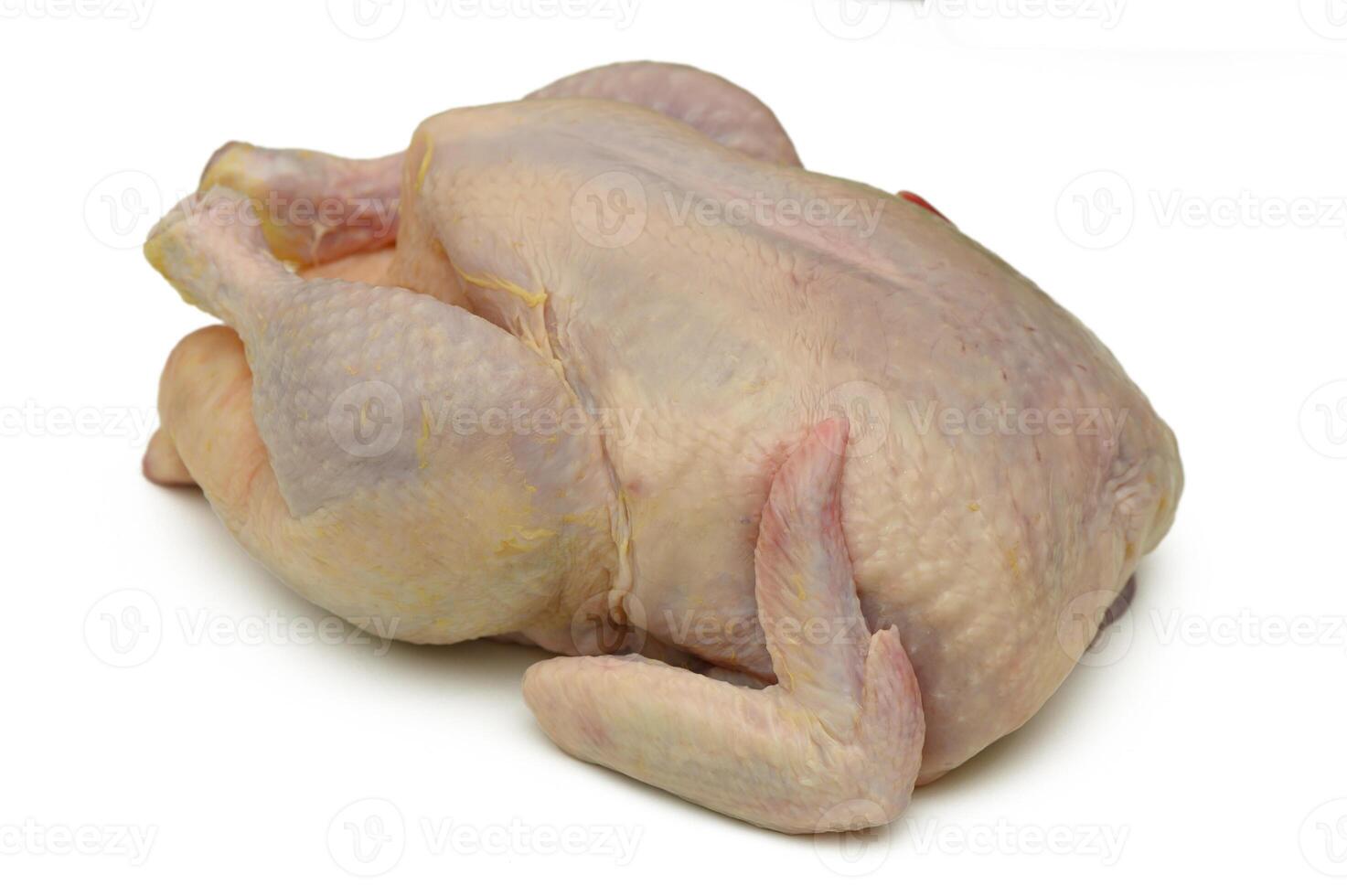 Freshly prepared whole chicken ready for culinary adventures in the kitchen during a lively family gathering photo