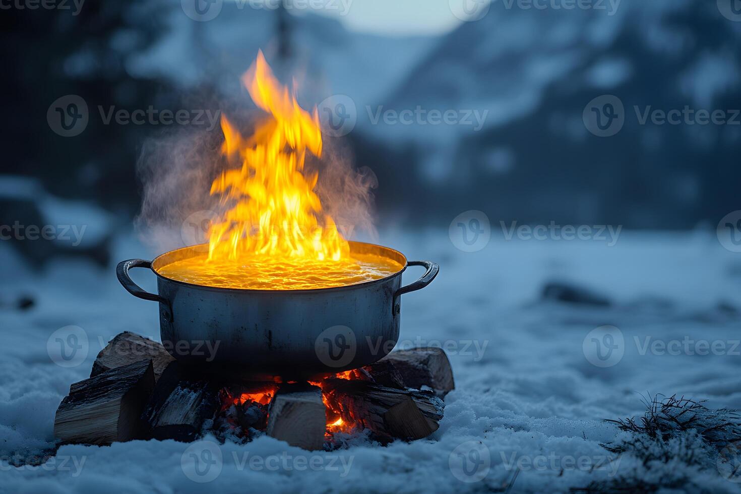 Winter Camping Adventure Cooking Over Open Fire in Snowy Mountains photo