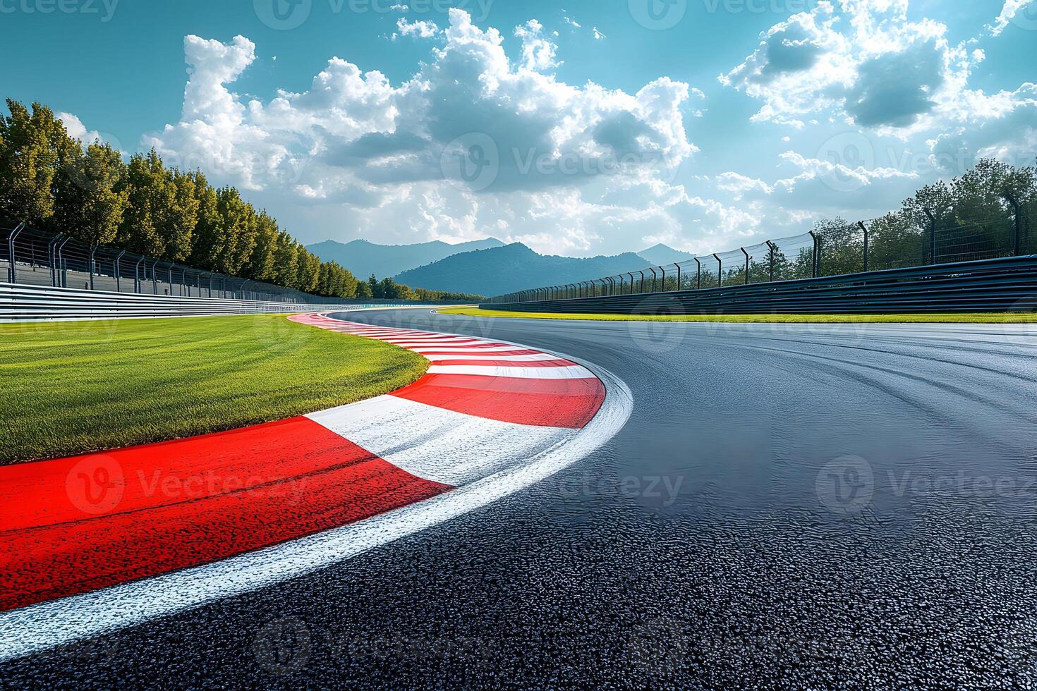 Scenic Curved Race Track with Vibrant Red and White Stripes Under a Bright Blue Sky photo