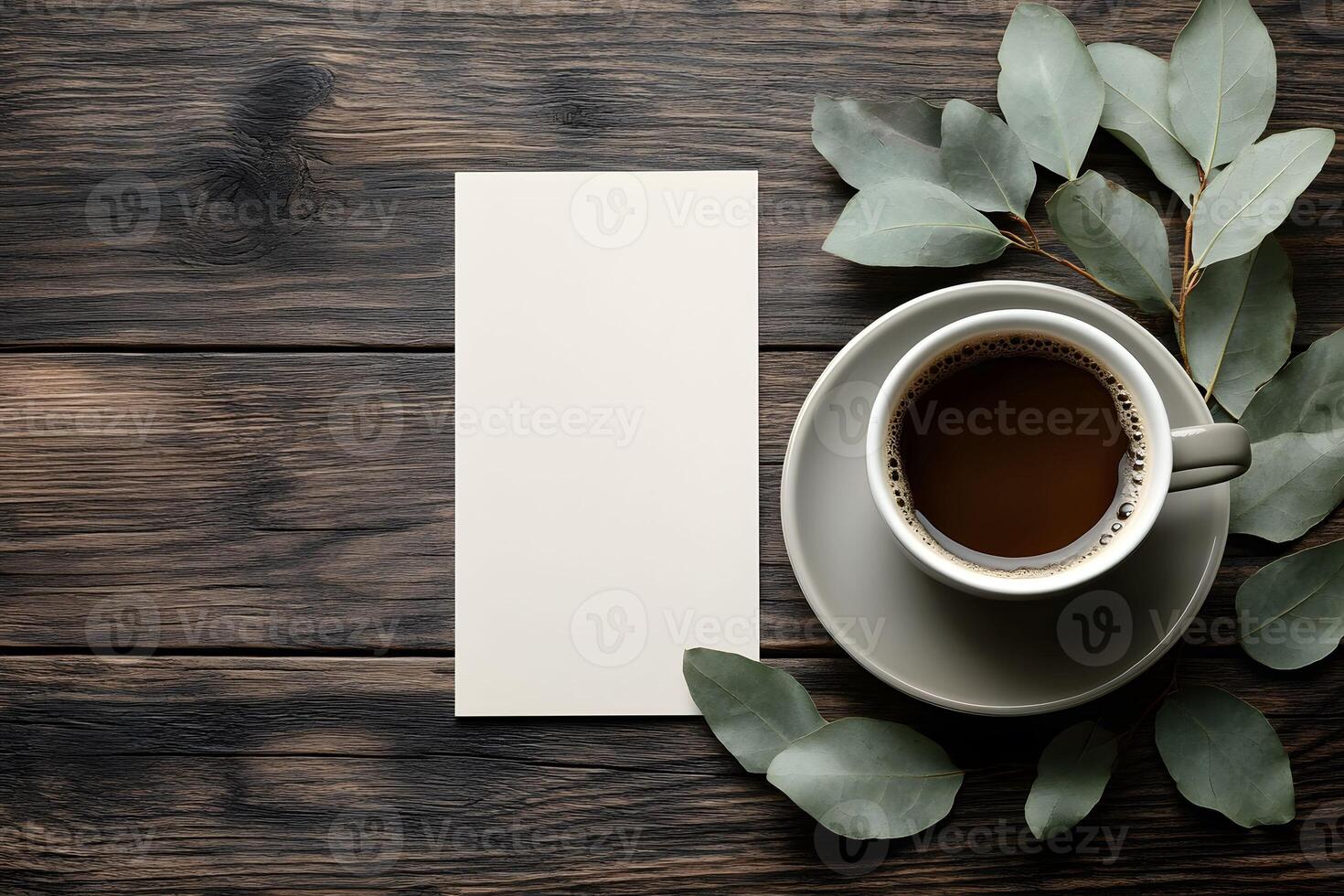 Rustic Coffee Break with Blank Card and Eucalyptus on Wooden Background for Branding Mockup photo