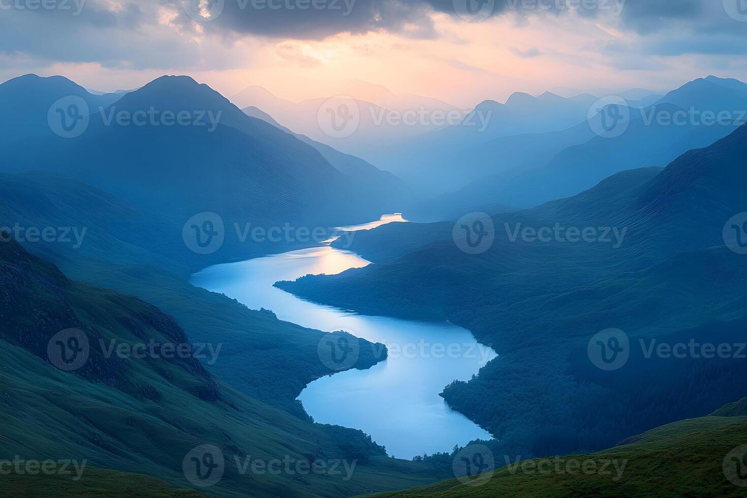 Serene Mountain Landscape at Sunrise with Meandering River photo