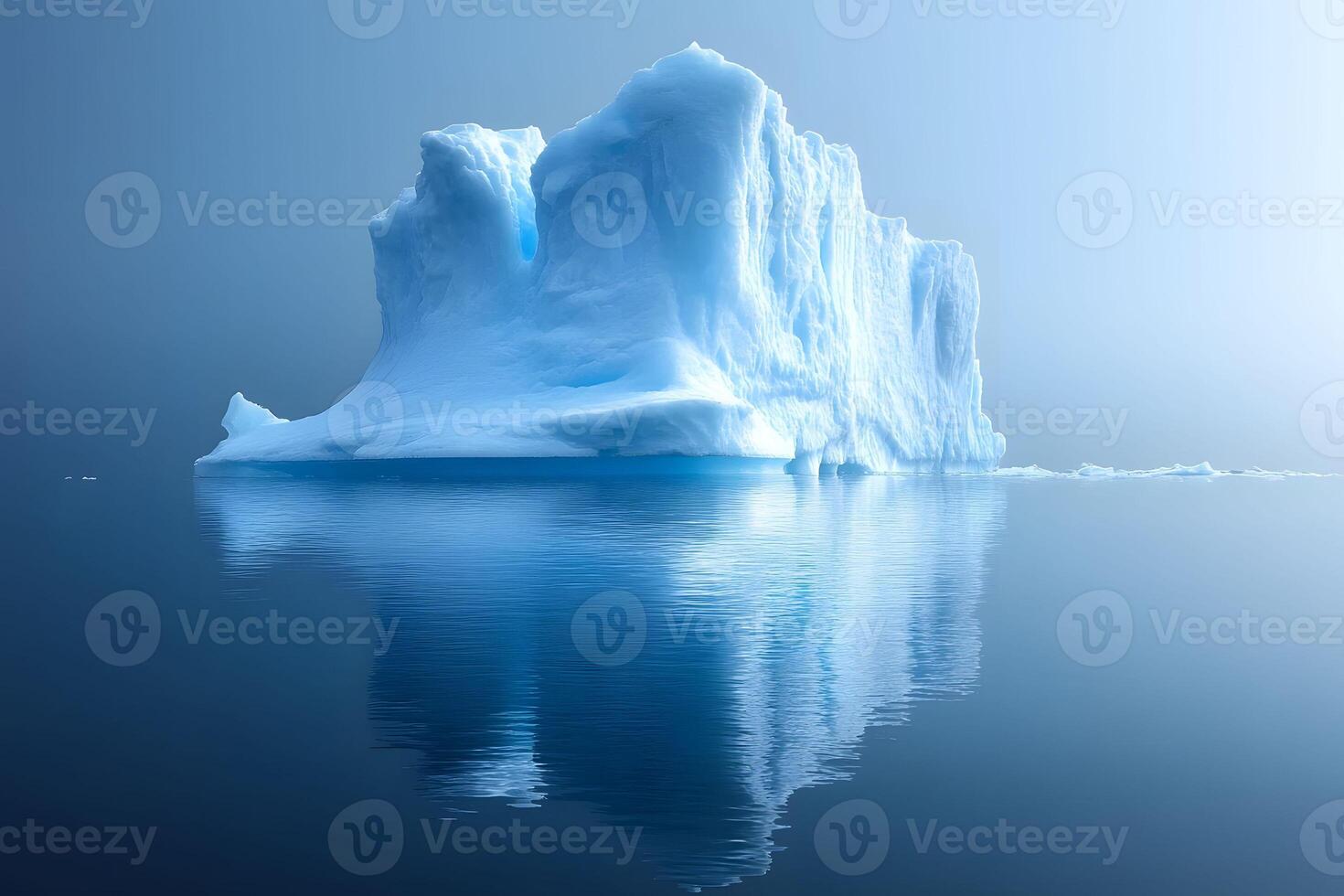 Majestic Iceberg Reflection in Serene Arctic Waters photo