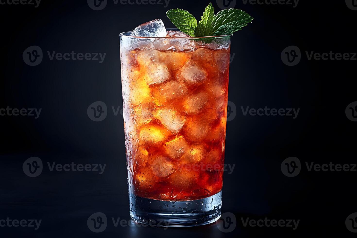 Refreshing Iced Tea with Mint Garnish Against Black Background photo