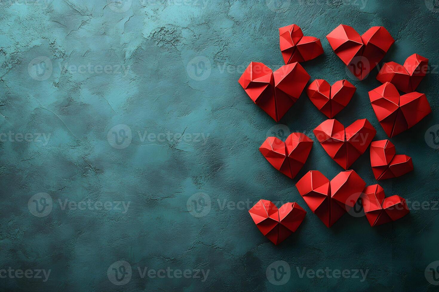 Origami Red Hearts on Textured Teal Background for Valentine's Day Design photo