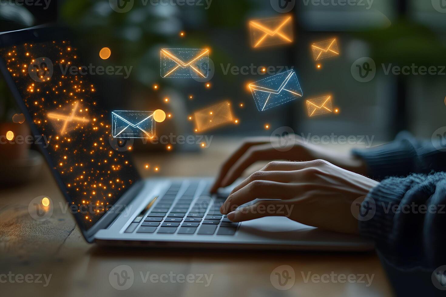 Digital Communication Hands Typing on Laptop with Floating Email Icons photo