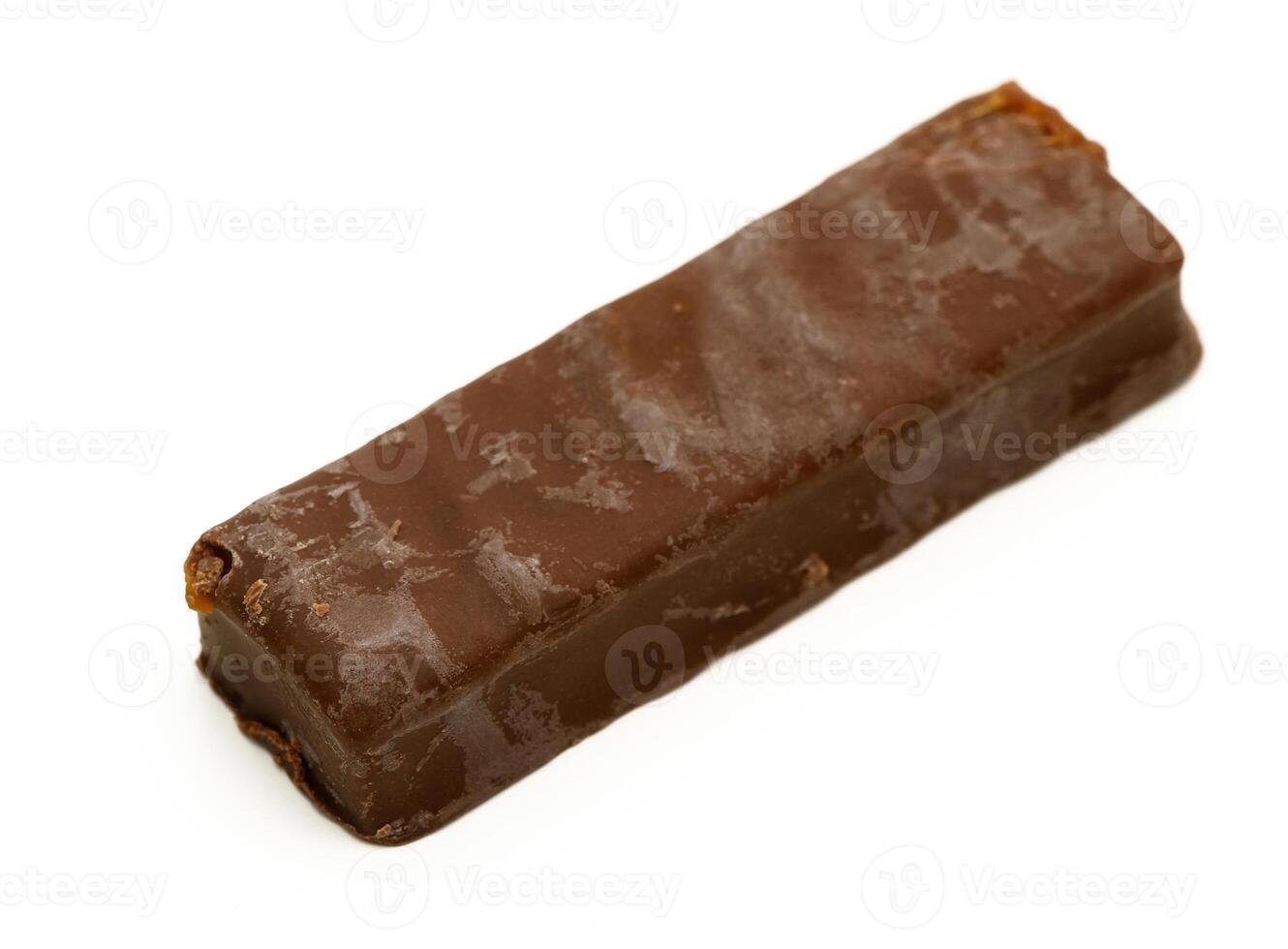 Delightful chocolate bar resting on clean surface showcasing its smooth texture photo