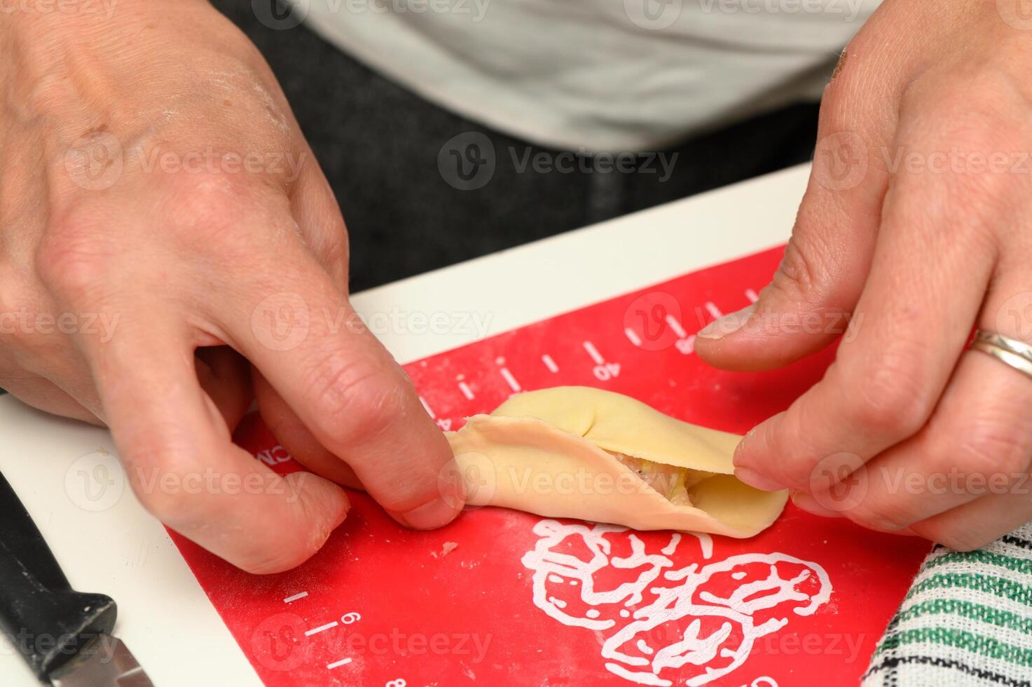 Crafting traditional dumplings in a cozy kitchen on a rainy afternoon brings warmth and comfort to the soul photo