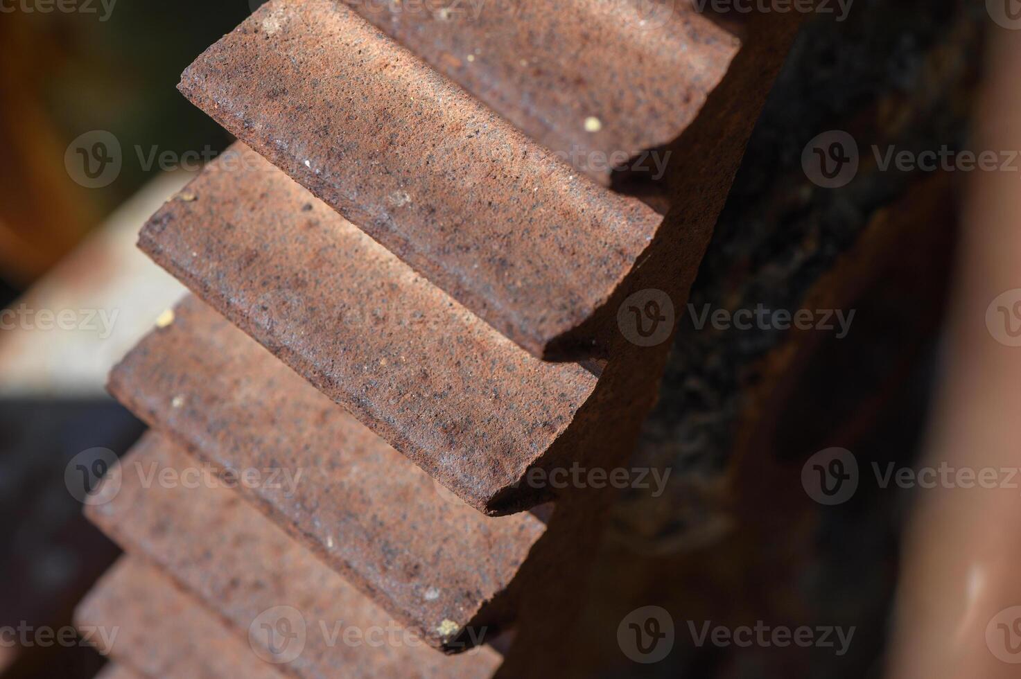 Rusty gear captures the essence of forgotten machinery on a sunny day in an abandoned factory photo