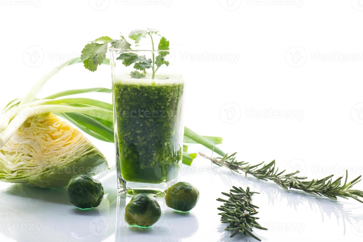 Green smoothie.Refreshing green smoothie with fresh vegetables and herbs photo