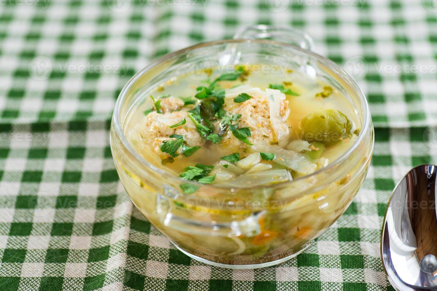 Cabbage soup with meatballs.Chicken soup with meatballs and cabbage photo