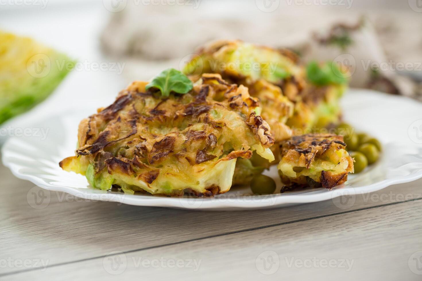 Vegetable simple breakfast.vegetable cutlets from early cabbage with peas photo